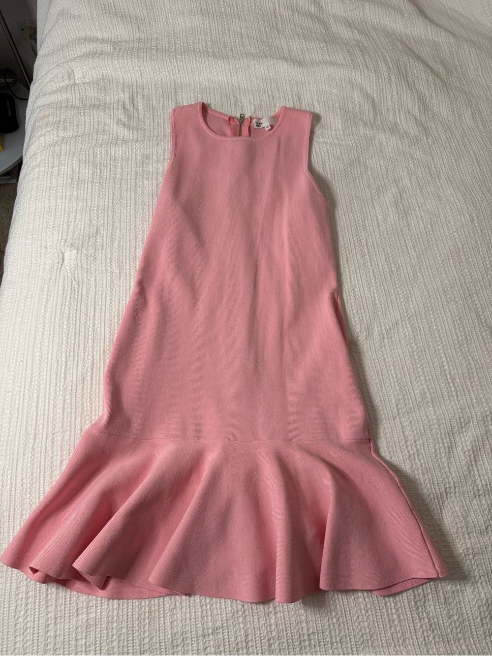 by the way. Pink Sleeveless Ruffle-Hem Dress